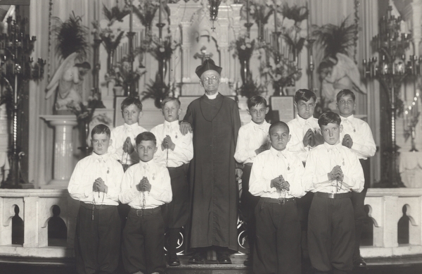 Father Baker with some altar servers